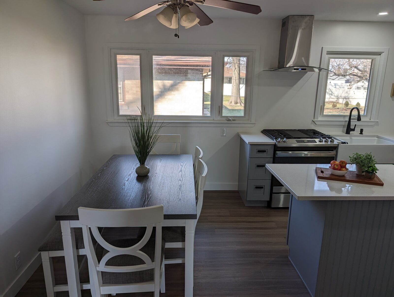 Kitchen and dining area with natural light and modern decor by Clear Contractors in Northwest Indiana